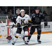 Peterborough Petes goaltender Easton Rye and defenceman Carson Cameron vs. the Kingston Frontenacs