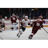 Peterborough Petes centre Adam Levac (right) vs. the Niagara IceDogs
