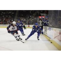 Syracuse Crunch defenseman Maxim Groshev (right) vs. the Cleveland Monsters