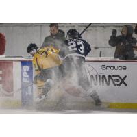 Shawinigan Cataractes left wing Chad Lygitsakos (left) vs. the Sherbrooke Phoenix