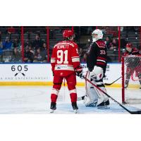 Rapid City Rush's Blake Bennett and Allen Americans' Marco Costantini on game night