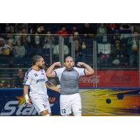 Tacoma Stars defender Nestor Hernandez (right) and forward Tyler John