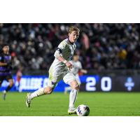 midfielder Joe Dale with the University of Washington