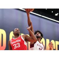 Cleveland Charge forward Norchad Omier (right) vs. the Memphis Hustle