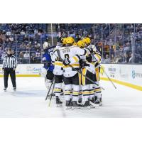 Wheeling Nailers exchange congratulations following a goal