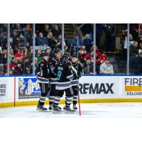 Kelowna Rockets huddle following a goal