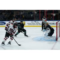 Rapid City Rush forward Ryan Wagner (left) looks for a shot against the Tahoe Knight Monsters