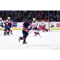 Saginaw Spirit defenseman Hayden Barch fires a shot against the Windsor Spitfires