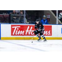 Kelowna Rockets centre Shane Smith gathers the puck