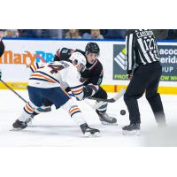 Kamloops Blazers' Ty Bonkowski versus Kelowna Rockets' Gabriel O'Brien