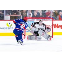 Spokane Chiefs' Coco Armstrong versus Vancouver Giants' Burke Hood