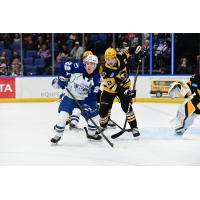 Syracuse Crunch's Jakob Pelletier and Wilkes-Barre/Scranton Penguins' Phil Kemp on the ice