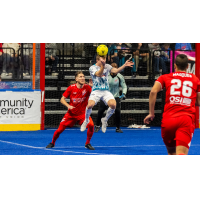 St. Louis Ambush go high for a ball against the Kansas City Comets