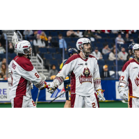 Oshawa Firewolves forwards Alex Simmons (left) and Tye Kurtz