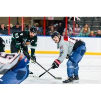 Utah Grizzlies' Tyler Gratton and Rapid City Rush's Blake Bennett on game night