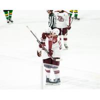 Peterborough Petes defenceman Matthew Perreault (right) congratulates Brennan Faulkner