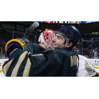 Toledo Walleye defenseman Brendon Michaelian hugs the goaltender after a win