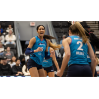 Omaha Supernovas outside hitter Reagan Cooper (left) and setter Sydney Hilley