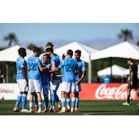 New York City FC gathers around Nico Fernández Mercau following his goal