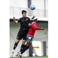 Beto Ydrach of Pittsburgh Riverhounds SC jumps to win a header