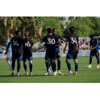 San Jose Earthquakes exchange congratulations after a goal against New York City FC at the 2026 Coachella Valley Invitational