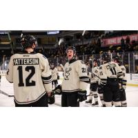 Iowa Heartlanders exchange congratulations