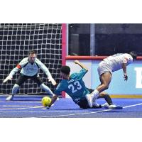 St. Louis Ambush defender John Gates hits the turf vs. Utica City FC