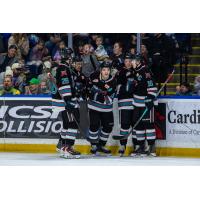 Kelowna Rockets gather following a goal