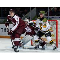 Peterborough Petes defenceman Grayden Strohack (left) and goaltender Easton Rye vs. the North Bay Battalion