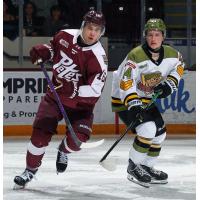 Peterborough Petes left wing Adam Novotný (left) vs. the North Bay Battalion