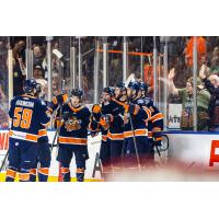 Greenville Swamp Rabbits exchange congratulations after a goal