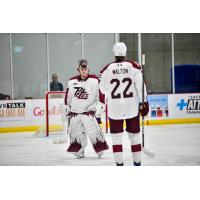 Peterborough Petes left wing Kieron Walton and goaltender Easton Rye