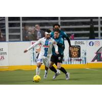 St. Louis Ambush midfielder Randy Martinez (right) vs. Utica City FC