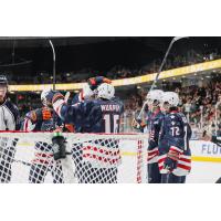 Greenville Swamp Rabbits' Wade Murphy congratulated by team