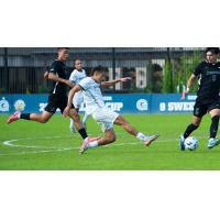 Midfielder Max Viera with Georgetown University