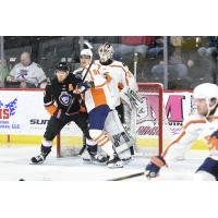 Greenville Swamp Rabbits defenseman Cole Fraser and goaltender Isaiah Saville