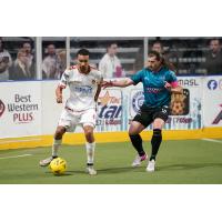 St. Louis Ambush midfielder William Eskay (right) vs. the Baltimore Blast