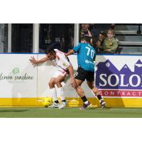 St. Louis Ambush forward Ozzy Santana (right) vs. the Baltimore Blast