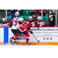 Belleville Senators defenceman Lassi Thomson (right) vs. the Utica Comets