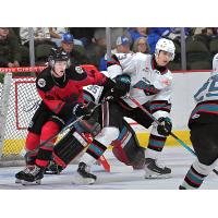 Wenatchee Wild's Drew Smith battles Kelowna Rocket's Owen Hayden