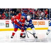 Syracuse Crunch center Tristan Allard (right) vs. the Laval Rocket