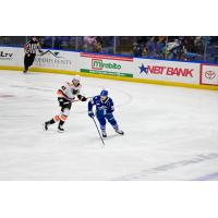 Lehigh Valley Phantoms' Oscar Eklind and Syracuse Crunch's Matteo Pietroniro in action