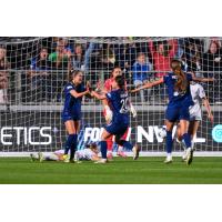 North Carolina Courage congratulate Ashley Sanchez (left) after her first goal