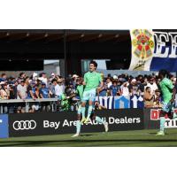 Seattle Sounders FC midfielder Paul Rothrock jumps in the air after his goal against the San Jose Earthquakes