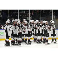 Vancouver Giants exchange congratulations after the win
