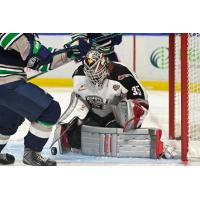 Vancouver Giants goaltender Burke Hood eyes the puck vs. the Seattle Thunderbirds