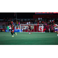 Phoenix Rising defender Aleksandar Vukovic advance the ball up the pitch
