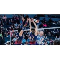 Grand Rapids Rise outside hitter Paige Briggs-Romine (left) and middle blocker Alyssa Jensen
