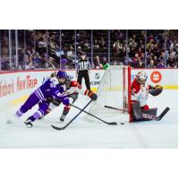 Ottawa Charge goaltender Kendra Woodland keeps a wary eye on the Minnesota Frost