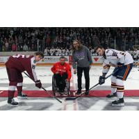 Puck drop between the Peterborough Petes and Barrie Colts with Paralympian Jon Thurston